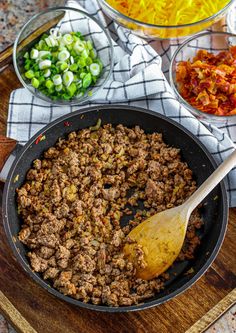 the food is prepared and ready to be cooked in the skillet on the table