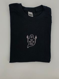 Halloween Tee! See You In Hell Ghost T-shirt embroidered on a 100% cotton tee in three color choices-sand beige, mocha brown or black. Made with love ❤️ Ships in 1-2 days with tracking ✉️ Custom Embroidered Cotton T-shirt For Streetwear, Embroidered Crew Neck T-shirt For Streetwear, Embroidered Relaxed Fit T-shirt For Streetwear, Y2k Style Cotton Halloween Tops, Y2k Cotton Tops For Halloween, Y2k Style Cotton Tops For Halloween, Embroidered Cotton Tops For Streetwear, Black Cotton T-shirt With Custom Embroidery, Black Embroidered Tops For Halloween