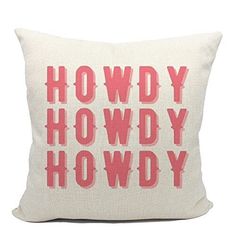 a pillow with the words howdy hodwy on it in pink and white