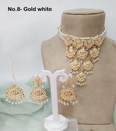 Gold Bridal Necklace With Pearl Drop For Diwali, Gold Bollywood Pearl Necklace For Festive Occasions, Gold Pearl Bridal Necklace For Diwali, White Gold Plated Jewelry Sets For Party, Gold Bollywood Pearl Drop Necklace, Gold Pearl Necklace For Diwali, Gold Pearl Bollywood Necklace, Gold Pearl Necklace With Tilla, Diwali Gold Pearl Necklace