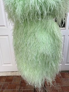 "Miki light green ostrich feather mini dress cocktail dress -Made to order -Please check my sizes chart before ordering -If it's doesn't fit with my size chart please measure your bust waist and hips -Dress made with ostrich feathers -Zipper closure on the back side -Straps can be taken off -Color: more than 18 colors -Dry clean only SGinstar Size Guide UK4/US0/EU32/AU4 Bust 31\"(78cm.) Waist24\"(60cm.) Hips33\"(83.5cm.) UK6/US2/EU34/AU6 Bust32\"(80.5cm.) Waist25\"(63cm.) Hips34\"(86cm.) UK8/US4 Strapless Feather Trim Wedding Dress, Strapless Wedding Dress With Feather Trim, Feathered Dresses For Wedding And Prom Season, Elegant Prom Dress With Ostrich Feathers, Feathered Wedding Dress For Prom Season, Green Mini Length Prom Dress, Glamorous Ostrich Feather Wedding Dress, Glamorous Wedding Dress With Ostrich Feathers, Green Mini Dress For Prom Season