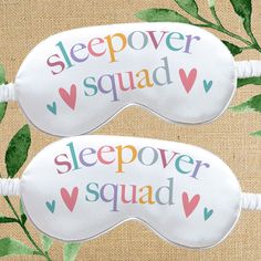 two sleep masks with the words sleepover squad and sleepover squad written on them