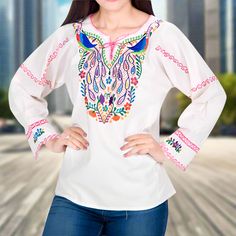 Blusa Bordada TM-77532 Embroidered Blouse White Embroidered Long Sleeve Top, Spring Festival Embroidered Long Sleeve Top, White Long Sleeve Blouse With Embroidered Hem, White Long Sleeve Top With Embroidered Hem, Long Sleeve Embroidered Top For Spring Festival, Summer Long Sleeve Embroidered Top With Multicolor Embroidery, Festival Embroidered Multicolor Top, Embroidered Multicolor Tops, Festival Embroidered Top With Embroidered Sleeves