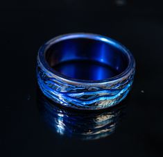 ------------------------------------------------FREE RING BOX - FREE ENGRAVING - Completely handmade ring 🔸🔸I used solid Titanium to create this ring. The thickness of the ring is about 2mm. Our ring is made entirely of solid titanium, "Lightning bolts" are hand carved so no two rings will be exactly the same. The color on the ring is the color of Titan made by "anodizing" method, not paint, so it does not fade over time. ⚡Please allow slight differences in color, texture, thickness as this is 100% handmade. Titanium is hypoallergenic, meaning it is safe to wear for those with sensitive skin, or those with allergies to various metals! ✨ ------------------ It takes 3-5 business days for me to finish this ring when you order it. Estimated shipping times (May be faster or later than expecte Adjustable Silver Titanium Rings, Titanium Promise Ring, Polished Titanium Ring Jewelry, Polished Titanium Ring, Lightning Ring, Cool Rings For Men, Lightning Bolts, Rings Unique, Titanium Ring