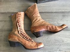 "Antique Button Up Tan Leather Boots Victorian Era Antique tan leather button up Victorian era boots. Cap toes, lined with linen cotton fabric. Wonderful period display boots. Leather soles, wood heels, buttons. Measures; 8.75\" sole (from bottom), 2 5/8\" width ( very narrow), 1.25\" heels , 9.5\" height. Please use measurements to determine sizing, these are antiques. Judging from the measurements I would say they were comparable to a US 4 or 4.5, with a very narrow width. Antique condition sh Vintage Leather Boots With Buttons, Boots Victorian, Ankle Boots Tan, Leather Button Up, Wood Heels, Tan Leather Boots, Wood Heel, Antique Buttons, Boots Leather