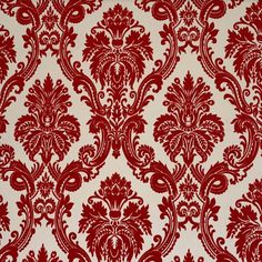 a red and white wallpaper with an ornate design