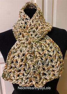 Looking for a short, warm, comfortable, easily-adorned scarf?  Well, here it is, just for you! MATERIALS Double-Thread (two yarns) 100% Acrylic  "I Love This Yarn" brand - Green Camo Stripes "I Love This Yarn" brand - Ivory Hand-crocheted by me in my smoke-free studio.  SIZE Approximately 39" long by 5-1/2" wide FEATURES 🧣 Double-thread construction.  🧣 Fashionably short, open weave, crochet, keyhole, pull-through scarf.  🧣 Fits cozily around your neck hanging straight or criss-crossed by inserting end of scarf into keyhole opening.  🧣 Medium-weight scarf can be worn comfortably both indoors (air conditioned spaces in summer  or with lowered thermostat in winter) and outside depending on the season. 🧣 Also a perfect scarf for folks in assisted-care.  CARE INSTRUCTIONS Hand wash or mac Beige Casual Scarf, Casual Beige Scarf, Casual Cream Scarves One Size Fits All, Casual Cream Scarf One Size, Casual Cream Scarf, One Size, Casual Crochet Scarves For Fall, Handmade Casual Scarves For Fall, Casual Green Handmade Scarf, Open Weave Crochet