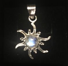 "Sterling Silver Genuine Rainbow Moonstone Sun Pendant 2cm wide = approx. 3/4\" 3.5cm long = approx. 1.37\" with bail included 18\" long chain included Boho and Hippie Style Sterling Silver Genuine Rainbow Moonstone Sun Necklace, Sun Pendant Chain Included" Moonstone Sun And Moon Pendant Jewelry, Moonstone Pendant With Sun And Moon Design, Moonstone Pendant Jewelry With Sun And Moon Design, White Pendant Jewelry With Sun And Moon Design, White Sun And Moon Pendant Jewelry, White Sun And Moon Design Pendant Jewelry, Sun And Moon Design Moonstone Jewelry As Gift, Symbolic Moonstone Jewelry With Moon Charm, Moonstone Moon-shaped Jewelry With Sun And Moon Design