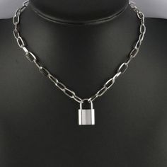 925 Silver Plated Padlock Necklace: Stainless Steel Chain with Lock Charm - A Stunning Jewelry Gift for Women Introducing a stunning addition to your jewelry collection that is sure to make a statement on any special occasion. This exquisite piece has been meticulously crafted with precision and care, making it a true embodiment of modern elegance and sophistication. From birthdays and weddings to anniversaries and graduations, this piece is the perfect gift for any special event.Whether you're looking to surprise a loved one or treat yourself, this piece of jewelry is a must-have addition to any wardrobe. Its versatile design allows it to complement any outfit, making it the perfect accessory for any occasion. With the holiday season just around the corner, this luxurious piece is the per Padlock Chain Necklace, Lock Jewelry Necklaces, Silver Chain Link Necklace Gift, Silver Chain Link Necklaces For Gift, Silver Chain Link Necklace For Gift, Silver Metal Necklace With Lock Detail, Silver Chain Necklace With Lock, Silver Lock Necklace Gift, Metal Chain Necklace With Lock For Gift