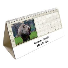 a desk calendar with an image of a rhino