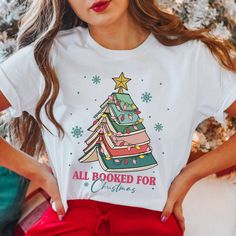 Librarian Book Christmas Shirt,  All Booked for Christmas Shirt, Book Lover Gift, Christmas Books Tree T-shirt, Bookish Shirt, Bookworm Christmas,  T-Shirt Description Experience everyday comfort with our high-quality t-shirts! Crafted from 100% ring-spun cotton, they offer unmatched softness and durability. Perfect for casual wear or layering. **Features - 100% ring-spun cotton for soft, breathable comfort 💯 - Lightweight and versatile, great for any season 🌞 - Unisex fit for a relaxed, all-d Grinch Im Booked Shirt, Book Tree, Book Christmas, Christmas Cute, Fashion Graphic, Christmas Books, High Quality T Shirts, Book Lovers Gifts, Librarian