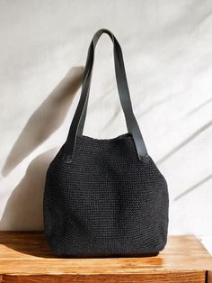 Any woman must have this bag for every fashionista. Whether you keeping it to yourself or gifting someone you care, it will be unforgettable. ✔️I made this beautiful bag from natural paper rope which is organic cotton and vegan leather in black. ✔️The interior of the straw summer bag is fully lined with cotton and has a magnetic button. Suitable for use as shoulder bag, beach bag, travel bag or party bag. ✔️The bag has cotton lining. A lining of the appropriate color is sewn into the crochet pap Casual Handheld Crochet Jute Bag, Casual Handheld Jute Crochet Bag, Vacation Square Hobo Bag With Braided Handles, Chic Handwoven Hobo Bag For Vacation, Black Straw Bag For Travel, Chic Jute Hobo Bag For Vacation, Black Woven Bucket Bag With Double Handle, Large Capacity Black Straw Bag For Travel, Large Capacity Black Straw Travel Bag