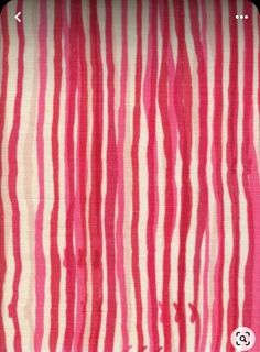 a pink and white striped fabric with red stripes on it's side, as well as the word hello kitty