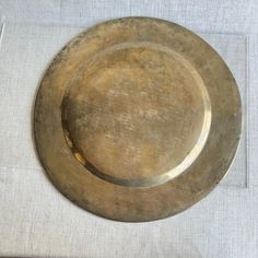 a metal plate sitting on top of a table