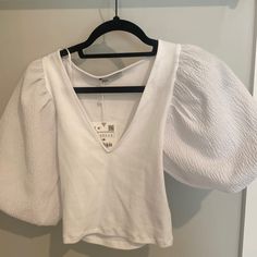 White Zara Shirt With Puffy Sleeves Size Medium New With Tags Never Worn White Puff Sleeve Top For Summer, White V-neck Puff Sleeve Top For Brunch, White V-neck Puff Sleeve Top For Day Out, White Trendy Puff Sleeve T-shirt, Trendy White Puff Sleeve T-shirt, White Puff Sleeve Trendy T-shirt, White V-neck Top For Brunch, Trendy White Shirt With Puff Sleeves, Trendy White Puff Sleeve Shirt