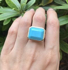 "A genuine large rectangular-shaped faceted Blue Turquoise, Robins Egg Blue Hue aka Sleeping Beauty, set on a minimalist bezel is a great statement/cocktail ring. Made to order in your choice of metal 14k Yellow Gold, Rose Gold or White Gold FINAL SALE Instagram Video ----------------- https://instagram.com/p/BiXzeTqlqIb/ https://instagram.com/p/Biuu4QnFZmJ/ https://instagram.com/p/BjstMbtlEEW/ Face measure 16mmx 18.7mm Shank width 3.5mm Sits off the finger 5.7mm ----> Please note there is an Blue Rectangular Faceted Jewelry, Turquoise Emerald Cut Gemstone Jewelry, Modern Blue Turquoise Gemstone Ring, Emerald Cut Turquoise Gemstone Jewelry, Rectangular Turquoise Gemstone Ring, Turquoise Gemstone Rings With Emerald Cut, Turquoise Emerald Cut Gemstone Ring, Turquoise Emerald-cut Gemstone Ring, Emerald Cut Turquoise Gemstone Ring