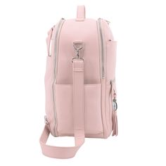 a pink backpack with zippers and straps