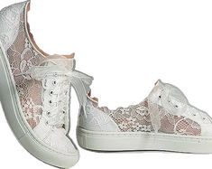 Elegant Lace-up Sneakers With White Sole, Elegant Low-top Wedding Sneakers, Elegant Low-top Sneakers For Wedding, White Lace-up Wedding Shoes, White Lace Round Toe Sneakers, Lace-up Lace Wedding Shoes With Lace Trim, White Lace Sneakers With Round Toe, White Lace-up Wedding Shoes With White Laces, White Lace-up Sneakers With Lace Material