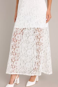 Show off all that Irresistible Charm in this darling maxi dress! Take in all the lace details and classic silhouette and know you've made the perfect choice! This dress features a high round neckline, a slip up the side, and a lace overlay with a lining that extends from the shoulder to the mid-thigh. 65% Cotton, 35% Nylon Hand Wash Cold Lined 100% Polyester Manufactured in China Designed in the USA Model is wearing a size x-small. Palm Royale, White Lace Maxi Dress, White Lace Maxi, Lace Layers, China Design, Red Dress Boutique, Lace Maxi, Walk Out, Lace Maxi Dress