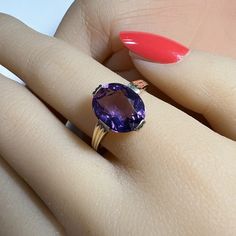 Ring width at top: 1/2 inch Ring Size: 9   Can be resized 6 to 10 Center stone: Amethyst.  Estimated 2 1/2 + carats Gift pendant height: 3 1/2 inches It is important that I turnover pieces that have been used in our costume/prop rentals. To show you my appreciation I'm incIuding a gift of a very fine late mid-century bold Navajo Kachina design pendant. I AM PRIMARILY A JEWELRY MANUFACTURER AND DIAMOND DEALER IN THE LOS ANGELES JEWELRY DISTRICT - dufaujewelry.com. PLEASE FEEL FREE TO MESSAGE ME WITH ANY QUESTIONS OR QUOTES ALONG THESE LINES Formal Amethyst Oval Cabochon Jewelry, Formal Amethyst Jewelry, Oval Cabochon, Elegant Oval Solitaire Gemstone, Formal Oval Cabochon Amethyst Ring, Elegant Oval Purple Gemstones, Elegant Purple Oval Gemstones, Classic Oval Cabochon Amethyst Jewelry, Elegant Oval Cabochon Amethyst Ring For Formal Occasions, Oval Solitaire Jewelry For Formal Occasions