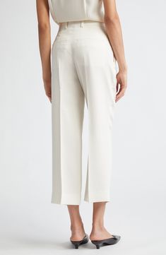 Elin Kling and Karl Lindman bring forth another capsule-wardrobe essential in sharply creased trousers boasting a straight-leg silhouette cropped at the ankle. 24 1/2" inseam; 18" leg opening; 11" front rise; 15" back rise (size 0US/32EU) Zip fly with hook-and-bar closure Side-seam pockets 78% viscose, 22% polyester Dry clean Made in Portugal Designer Clothing Elegant Cropped Leg Dress Pants For Work, Classic Cropped Leg Dress Pants, Elegant Cropped Leg Workwear Pants, Elegant Cropped Leg Business Casual Pants, Elegant Cropped Leg Pants For Business Casual, Classic Cropped Leg Dress Pants For Office, Elegant Cropped Leg Dress Pants For Office, Elegant White Cropped Leg Pants, Elegant White Cropped Pants