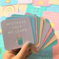 someone holding up a card with the words,'make me learn'on it