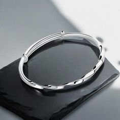 ⚫️Exclusive 50% off Black Friday Sale ⚫️ ✨ Limited Stock Left! ✨ Elegant Mobius Sterling Silver Bangle | Shiny Chic Adjustable Bangle for Her | Hammered Bangle | Unique Bracelet for Women 💫 Enjoy a taste of modern luxury with our gorgeous Mobius Sterling Silver Bangle! 💫 🎉 Experience HUGE savings as we celebrate our store launch with our LOWEST EVER PRICES (while stocks last)! 🎉 🎁 COMES READY TO GIFT IN A LUXURY CREAM GIFT BOX 🎁 Crafted for both elegance and everyday wear, our exquisite ad Sterling Silver Bangle, Adjustable Bangle, Elegant Bracelet, Unique Bracelets, Sterling Silver Bangles, Silver Bangle, Bracelet For Women, Silver Bangles, Adjustable Bracelet