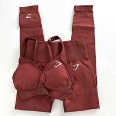 Leggings Are Small Bra Is Xs Both: Vital Seamless Collection Brick Red Marl New In Packaging Seamless Sports Pants, Red Seamless Activewear For Sport, Red Breathable Fitted Activewear, Fitted Red Activewear With Seamless Construction, Breathable Stretch Training Sets, Red Breathable Sporty Leggings, Casual Seamless Sports Sets, Sporty Red Breathable Leggings, Fitted Breathable Red Leggings