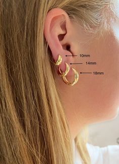 These 14k gold filled hoop earrings are great for everyday wear. They look perfect on their own or stacked with other earrings DETAILS - 14k gold filled hoop earrings come in three sizes:     -18mm (outer diameter)x 4mm thickness     -14mm (outer diameter) x4mm     -10mm (outer diameter)x 3mm - sold as pair - Hypoallergenic, lead free, nickle free - Comes beautifully packaged ready for gift giving PRODUCTION AND SHIPPING - We offer FREE WORLD WIDE shipping  - Every piece is handmade to order in our little studio in Melbourne, Australia - We aim to ship your order in 1-2 business days - Estimated domestic (Australia) shipping times: 10-15 business days - Estimated international shipping times: 15-25 business days WHAT IS GOLD FILLED Gold filled is the closest alternative to solid gold. It i Gold Stackable Round Huggie Earrings, 14k Gold Filled Tarnish Resistant Drop Huggie Earrings, 14k Gold-filled Tarnish-resistant Drop Huggie Earrings, Stackable Huggie Hoop Earrings In Yellow Gold, Dainty Gold Huggie Earrings For Everyday, Gold Dainty Huggie Earrings For Everyday, Everyday Dainty Gold Huggie Earrings, 14k Gold Small Hoop Stackable Earrings, Small Yellow Gold Stackable Hoop Earrings