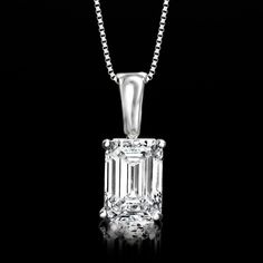 Ross-Simons - 2.00ct Emerald-Cut Lab Grown Diamond Pendant Necklace. 18". An emerald-cut solitaire is as classic as can be, and our modern offering comes at a fantastic value! Treat yourself to this scintillating 2.00 carat lab-grown diamond pendant necklace, featuring all the elegance and elongated facets you adore. Finely crafted in polished 14kt white gold and suspended from a sleek box chain. Lab-grown diamonds are identical to mined diamonds according to their optical, physical and chemical Classic White Gold Solitaire Necklace With Radiant Cut, Classic Radiant Cut Solitaire Necklace In White Gold, Classic White Gold Radiant Cut Solitaire Necklace, Fine Jewelry Emerald Cut Diamond Necklace With Prong Setting, Classic Vvs Clarity Baguette Cut Diamond Necklace, Formal Emerald Cut Diamond Necklace, Anniversary Solitaire Necklace With Emerald Cut In Prong Setting, Anniversary Emerald Cut Solitaire Necklace With Prong Setting, Emerald Cut Solitaire Necklace For Anniversary With Prong Setting