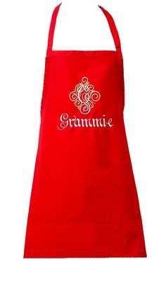 a red apron with the word granau on it and an ornate design in white