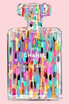 a chanel bottle with colorful paint sprinkles on it