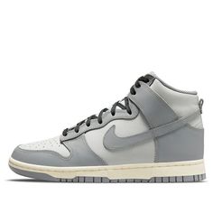 Vintage vibes meet modern style in the Nike Dunk High ‘Aged Grey’. This sneaker combines a neutral grey color palette with a vintage-inspired design for a chic and stylish look. The all-leather upper is adorned with shades of grey, while the black laces and perforated toe box add a touch of contrast. The high-cut collar and flexible nylon tongue provide a comfortable and secure fit, while the durable rubber cupsole ensures lasting wear. Pre-yellowed sidewalls and a grey rubber outsole complete the design of this must-have sneaker. (SNKR/Skate/Light/Mid Top/Women's/Non-Slip) Modern Gray Sneakers For Streetwear, Modern Gray High-top Sneakers, Nike High-top Sneakers In Gray With Boost Midsole, Nike Gray Urban Sneakers, Modern Gray High-top Sneakers With Round Toe, Grey Color Palette, Nike Dunk High, Dunk High, Mid Top