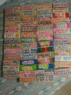 many different types of stickers that are on a tablecloth with words written in them