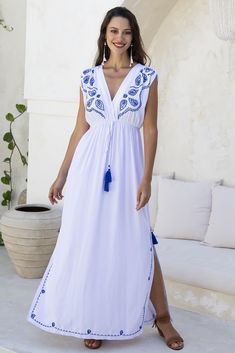 Beautiful boho inspired aqua blue long maxi dress has exquisite embroidery surrounding a plunging deep v neck bodice. This long summer dress has an angled shoulder design and empire waist that accents your curves in all the right places Adorned with pink tassels on front, sides and back, you can dress this womens casual sundress up or down. Wear with flat sandals for a maxi boho summer dress style, or pair with heels and a shawl for an evening out Full flowy skirt is flattering at the hips. Comf Long Blue Maxi Dress, Summer Dress Style, Long Summer Dress, Casual Sundress, Deep V Neck Dress, Loungewear Dresses, Summer Sundress, Long Beach Dress, Boho Summer Dresses