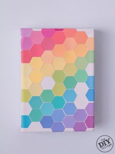 a multicolored hexagonal pattern on a white background with the words diy written below it