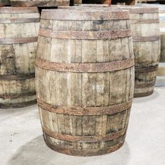 several wooden barrels stacked on top of each other