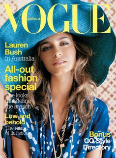 a woman wearing a blue hat on the cover of a magazine