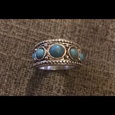 Turquoise Tribal Ethnic Ornate Embellished Circle Stone Eternity Silver Ring Size 7. Five Turquoise Stones In Descending Size With The Central As The Largest. Lots Of Carved Silver Dots Created A Cool Tribal/Ethnic/Southwestern/Unique Look! Thick Sturdy Band. New. If You Want It, Don’t Let It Get Away Send Me An Offer! I Love To Do Bundle Order Discounts! Turquoise Bohemian Ring For Festival, Bohemian Turquoise Ring For Festival, Adjustable Bohemian Turquoise Ring With Stone Setting, Bohemian Silver Turquoise Ring With Stone Setting, Silver Bohemian Turquoise Ring With Stone Setting, Bohemian Turquoise Ring With Stone Setting, Blue Bohemian Jewelry With Stone Setting, Bohemian Style Turquoise Ring With Stone Setting, Bohemian Round Turquoise Ring With Stone Setting