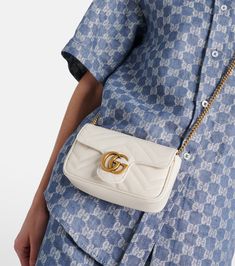 GG Marmont Super Mini shoulder bag in white - Gucci | Mytheresa Gucci White Bag, White Gucci Bag For Everyday Luxury, White Luxury Gucci Shoulder Bag, Luxury White Gucci Shoulder Bag, Gucci Marmont Mini, Marmont Super Mini, Gucci Marmont, Gucci Gg Marmont, Gg Marmont