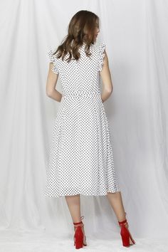 Super cute polka dot button down dress by Fate + Becker. With collar, ruffle trim shoulders, tie waist and hidden pockets, this midi length dress captures a vintage feel and executes it perfectly. Don't miss out, very limited stock of this item! You'll be ready for any occasion that pops up! Whether it's a picnic in the park or a day at the office, this dress has you covered with its functional style and timeless silhouette. Plus, the hidden pockets are the perfect spot to store your secrets. You don't want to miss out on this one! Fabric : Viscose Care Instructions : Wash separately Cool gentle hand wash Do not bleach or soak Do not tumble dry Drip dry in shade on hanger Warm iron with steam on reverse side to bring garment back into shape Dry cleanable Polka Dot Dresses, Long Sleeve Summer Dress, Maxi Dress Winter, Functional Style, Linen Loungewear, White Polka Dot Dress, Picnic In The Park, Sleeveless Dress Summer, Women Party