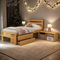 a bed room with a neatly made bed and a christmas tree on the wall behind it