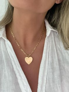 Vintage Inspired Gold Heart Necklace  D E T A I L S - 18k Gold Filled Paperclip Chain 3mm  - Gold Filled Pendant  - Pendant Height: 25 millimeters - Pendant Width: 21 millimeters - Lobster Clasp Closure - Made with love by Dylan Rae *Model is wearing the 16" Chain  P A C K A G I N G Dylan Rae Jewelry is elegantly presented in our premium microfiber jewelry case, ensuring both protection and a polished presentation. If you require separate packaging for multiple items, kindly let us know. C A R E Vintage Heart Necklace, Gold Heart Necklace, Vintage Heart, Necklace Vintage, Jewelry Case, Gold Filled Jewelry, Gold Heart, Heart Pendant Necklace, Necklace Gift