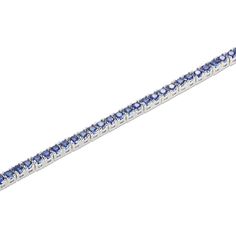 This elegant line bracelet is adorned with sumptuous round blue lab-created sapphires that shimmer within links of sterling silver. The bracelet measures 7.25 inches and secures with a box clasp. Silver Sapphire Tennis Bracelet, Blue Jubilee Tennis Bracelet Fine Jewelry, Blue Sterling Silver Diamond Jubilee Bracelet, Blue Sapphire Tennis Bracelet With Gemstone, Blue Sapphire Gemstone Tennis Bracelet, Blue Cubic Zirconia Tennis Bracelet Fine Jewelry, Classic Blue Diamond Bracelet In Sterling Silver, Blue Sapphire Diamond Round Bracelet, Blue Sapphire Round Bracelet