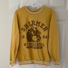 The Breakfast Club Varsity Sweatshirt New Without Tag Size L Never Worn Excellent Condition Measurements (Laid Flat) Bust (Pit To Pit) 22“ Length 24.5" Sleeves 19" Yellow Letter Print Sweatshirt For Fall, Oversized Yellow Crew Neck Sweatshirt, Oversized Yellow Letter Print Tops, Oversized Yellow Tops With Letter Print, Oversized Yellow Sweatshirt With Letter Print, Trendy Yellow Sweatshirt With Letter Print, Trendy Yellow Crew Neck Sweatshirt, Yellow Sporty Sweatshirt With Graphic Print, Sporty Yellow Sweatshirt With Graphic Print