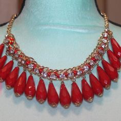 Nwt: Red Teardrops/Clear Rhinestones Running All The Way Down The Red Ribbon Which Is 4" And The Red Teardrops Are 2" Long The Necklace Is 18" Red Teardrop Necklace For Party, Red Jeweled Rhinestone Necklace For Party, Red Jeweled Crystal Necklace, Red Crystal Necklaces With Jewels, Red Rhinestone Party Necklaces, Red Crystal Necklace With Jewels, Rhinestone Necklace, Red Ribbon, Clear Rhinestones