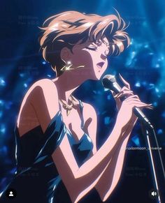 a woman holding a microphone in her right hand and singing into the microphone with blue lights behind her