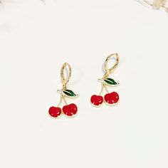 Jazz up your style with Jazzi J.! These cherry charm hoop huggie earrings will add a funky and stylish edge to any outfit. Visit the Jazzi J shop for more items - https://jazzijbykaren.etsy.com MATERIALS Alloy cherry charms, 18k gold plated huggie hoop earrings. PACKAGING Earrings are sent in a secure and pretty package. If you would like to add a personalised note, please message me. Trendy Huggie Earrings For Party, Trendy Huggie Earrings As A Gift, Trendy Pierced Huggie Earrings As A Gift, Trendy Drop Clip-on Earrings As Gift, Trendy Birthday Earrings For Pierced Ears, Trendy Red Earrings For Birthday, Trendy Round Earrings For Valentine's Day, Playful Hoop Earrings For Gift, Playful Hoop Earrings For Gifts