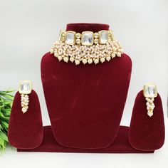 You will absolutely fall in love with these necklace sets. They are minimalistic and can be styled with Indian/Indo-western or Western wear. They are true replicas of the original polki necklaces. Premium Quality Kundan Choker Set with Earrings.  You will absolutely adorn this beautiful classic Premium Quality Kundan Choker set with earrings. Premium Quality and High craftsmanship 100% Satisfaction Guarantee: Long Lasting Plating, High-Quality Stones. Also, It looks great with modern and traditional silhouettes. Weight: 110 grams Adjustable: Yes with a ball and joint Earrings weight: 12 grams each Earrings length: 2 inches Earrings Closure: Screw back Material: Brass *Handmade in India Kundan Choker Set, Kundan Choker, Polki Necklace, Necklace Sets, Choker Set, Indian Wedding Jewelry, Indo Western, Kundan Jewellery, Brass Jewelry