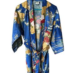 Stunning Kimono Robe In Excellent Condition No Known Flaws Appears Unworn. Vibrant Colors Floral Design With Gold Accents. Wrap Style With Detachable Belt Front Pockets. Size Tag 42 Approximate Measurements Armpit To Armpit 24 Inches Hem 41 Inches Blue Floral Design, Sleepwear Robe, Japanese Kimono, Wrap Style, Gold Accents, Size Tag, Blue Gold, Blue Floral, Women's Intimates